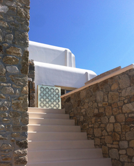 Special cut gold outdoor mirror panel in Mykonos