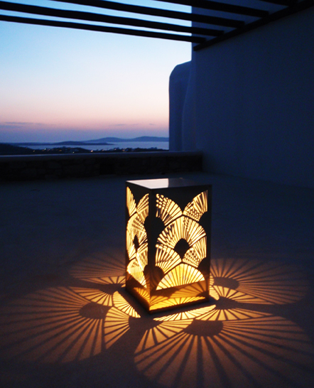 Special cut gold mirror metal lamp in a Mykonos villa